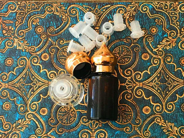 empty bottle, inserts and domed lids for example