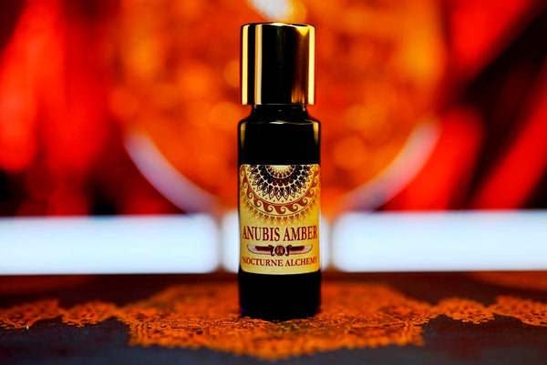 Anubis Amber 5ml slender blue bottle with insert dropper and gold-toned screw lid