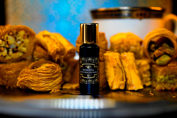 Basbousa.  5ml Slender Blue bottle with dropper insert and gold-tone screw lid. 