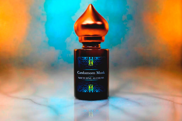 6ml amber cylindrical bottle with matte Copper-toned domed lid and insert.  Cardamom Musk