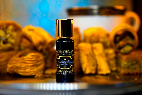 Chocolate Cinnamon Ceylon.  5ml Slender Blue bottle with dropper insert and gold-tone screw lid. 