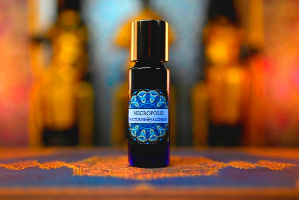 5ml Slender Blue bottle with insert dropper and shiny gold screw lid. Necropolis