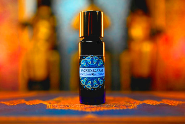 5ml Slender Blue bottle with insert dropper and shiny gold screw lid. Sacred Scarab