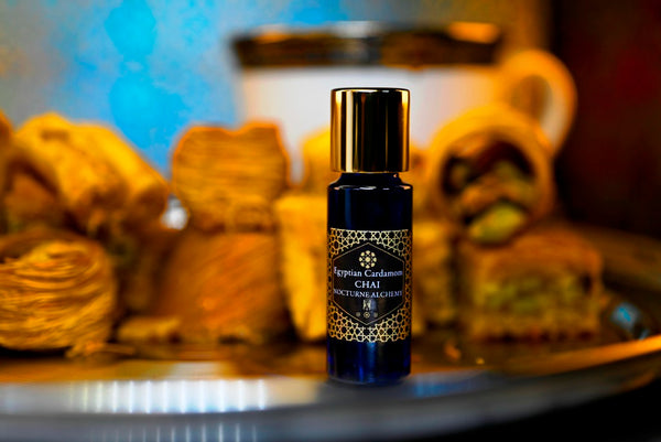 Egyptian Caramel Chai 5ml Slender Blue bottle with dropper insert and gold-tone screw lid. 