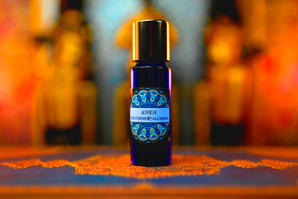 5ml Slender Blue bottle with insert dropper and shiny gold screw lid. ANKH