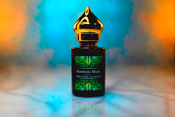 6ml amber cylindrical bottle with gold-toned domed lid and insert.  Gardenia Musk