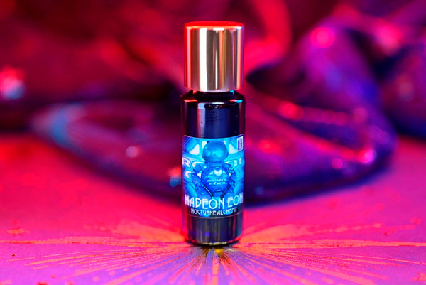 Slender blue 5ml has an insert dropper and a shiny gold-tone screw lid. 
