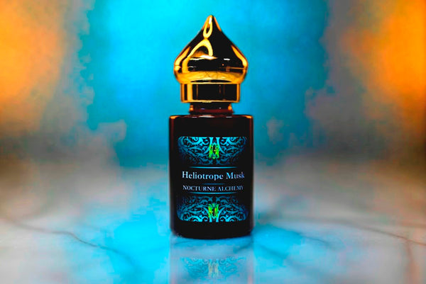 6ml amber cylindrical bottle with gold-toned domed lid and insert.  Heliotrope Musk