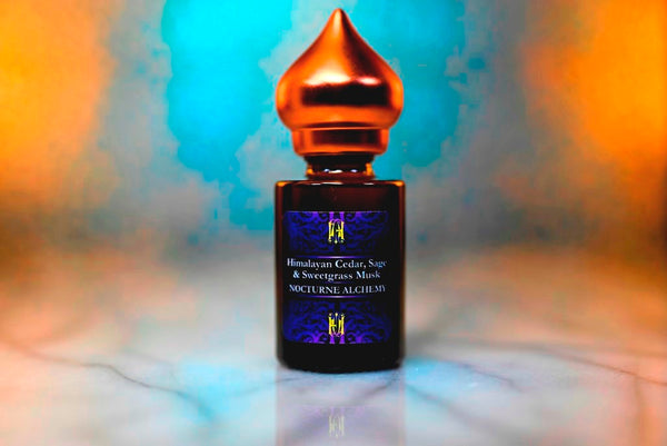 6ml amber cylindrical bottle with matte copper-toned domed lid and insert.  Himalayan Cedar, Sage & Sweetgrass Musk