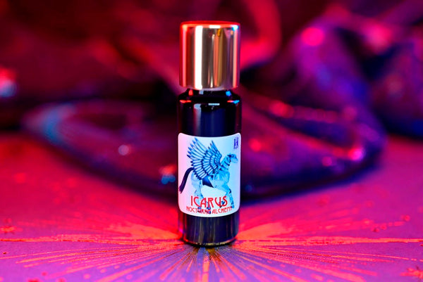 Slender blue 5ml has an insert dropper and a shiny gold-tone screw lid. 
