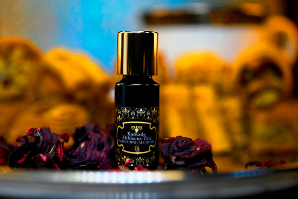 Karkade Hibiscus Tea. 5ml Slender Blue bottle with dropper insert and gold-tone screw lid. 