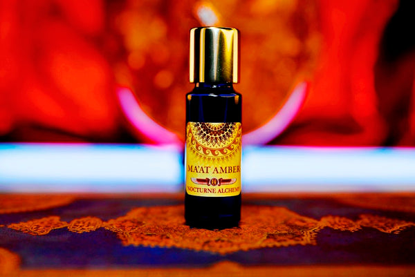 Ma'at Amber 5ml slender blue bottle with insert dropper and gold-toned screw lid