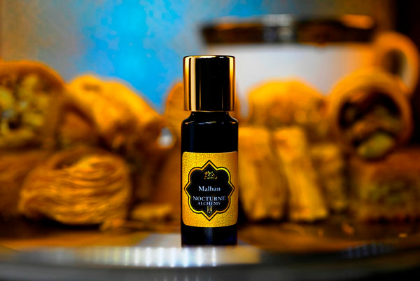 Malban.  5ml Slender Blue bottle with dropper insert and gold-tone screw lid. 