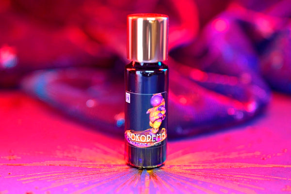 Slender blue 5ml has an insert dropper and a shiny gold-tone screw lid. 