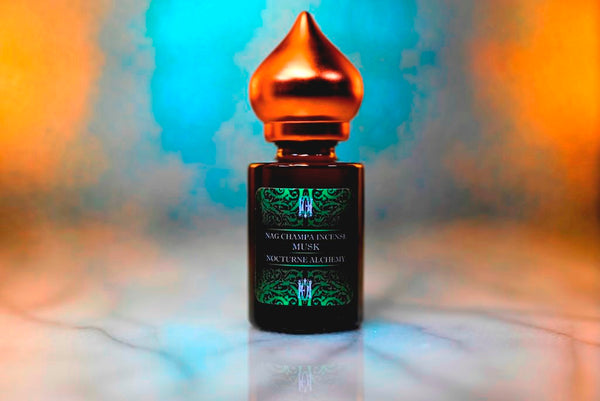 6ml amber cylindrical bottle with matte copper-toned domed lid and insert.  Nag Champa Incense Musk