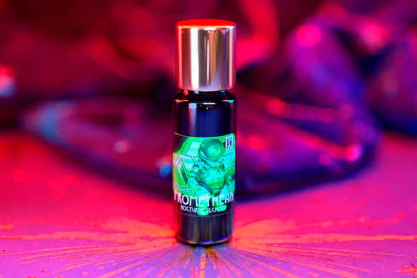 Slender blue 5ml has an insert dropper and a shiny gold-tone screw lid. 