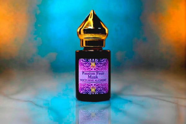 6ml amber cylindrical bottle with gold-toned domed lid and insert.  Passion Fruit Musk