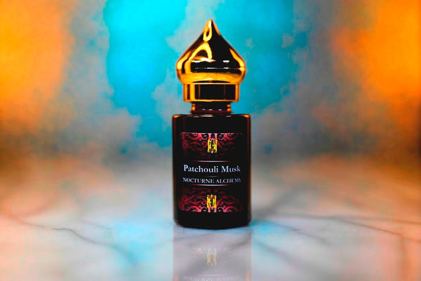 6ml amber cylindrical bottle with gold-toned domed lid and insert.  Patchouli Musk