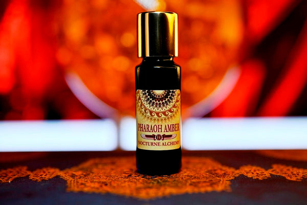 Pharaoh Amber 5ml slender blue bottle with insert dropper and gold-toned screw lid