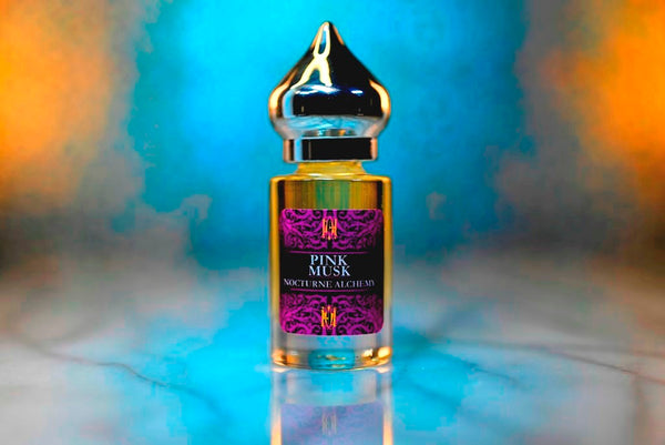 6ml clear cylindrical bottle with silver-toned domed lid and insert.  Pink Musk