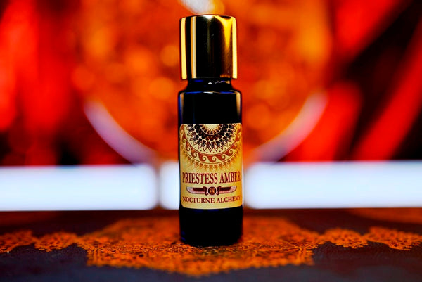 Priestess Amber 5ml slender blue bottle with insert dropper and gold-toned screw lid