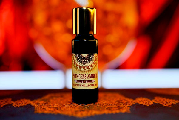 Princess Amber 5ml slender blue bottle with insert dropper and gold-toned screw lid