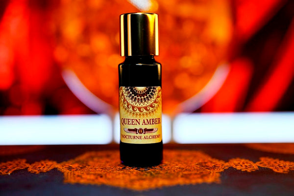 Queen Amber 5ml slender blue bottle with insert dropper and gold-toned screw lid