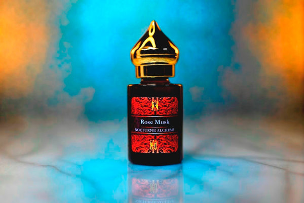 6ml amber cylindrical bottle with gold-toned domed lid and insert.  Rose Musk