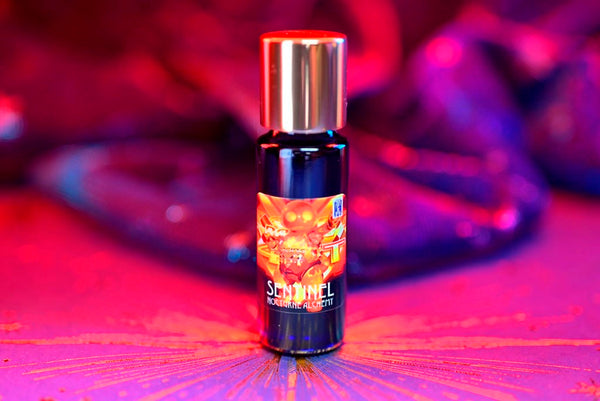 Slender blue 5ml has an insert dropper and a shiny gold-tone screw lid. 