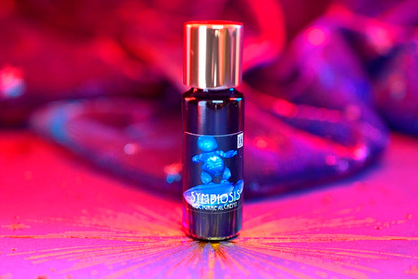 Slender blue 5ml has an insert dropper and a shiny gold-tone screw lid. 