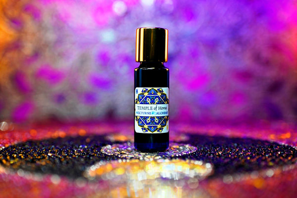 Temple of Horus in 5ml Slender Blue bottle with insert and shiny gold-tone screw lid