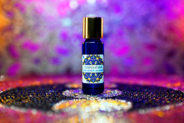 Temple of Sobek in 5ml Slender Blue bottle with insert and shiny gold-tone screw lid