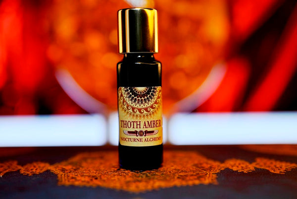 Thoth Amber 5ml slender blue bottle with insert dropper and gold-toned screw lid