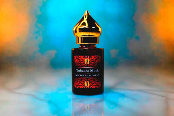 6ml amber cylindrical bottle with gold-toned domed lid and insert.  Tobacco Musk