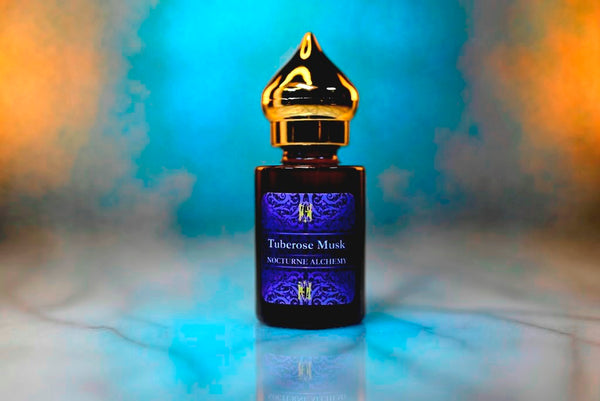 6ml amber cylindrical bottle with gold-toned domed lid and insert.  Tuberose Musk