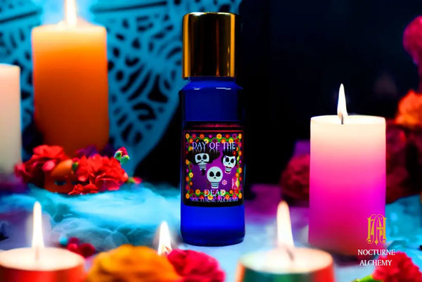 Day of the Dead. 5ml Slender Blue bottle with insert dropper and shiny gold screw lid.
