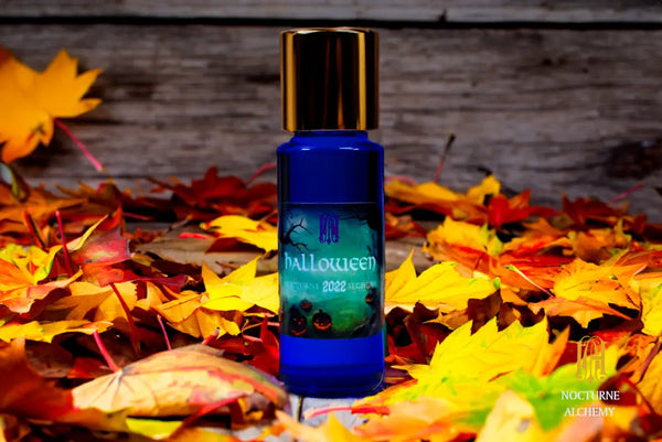 Halloween 2022. 5ml Slender Blue bottle with insert dropper and shiny gold screw lid.