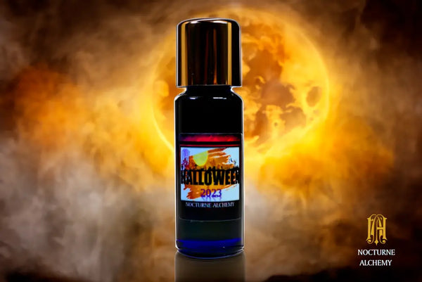 Halloween 2023.  5ml Slender Blue bottle with insert dropper and shiny gold screw lid.