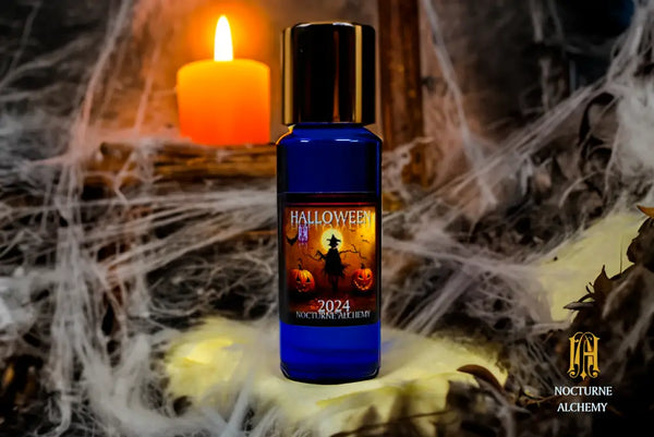 Halloween 2024.  5ml Slender Blue bottle with insert dropper and shiny gold screw lid.