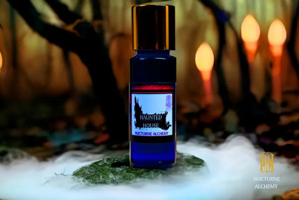 Haunted House. 5ml Slender Blue bottle with insert dropper and shiny gold screw lid.