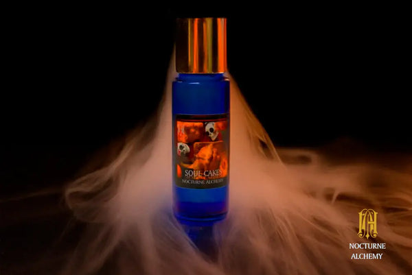 All Hallows' Eve 5ml Slender Blue bottle with insert dropper and shiny gold screw lid.