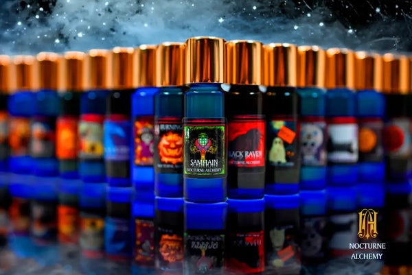 Group photo of All Hallows' Eve in the slender blue bottle with shiny gold lid