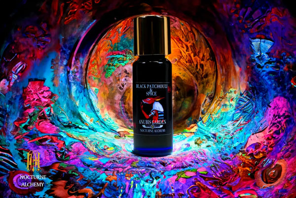 Black Patchouli & Spice 5ml Slender Blue bottle with insert dropper and shiny gold screw lid.