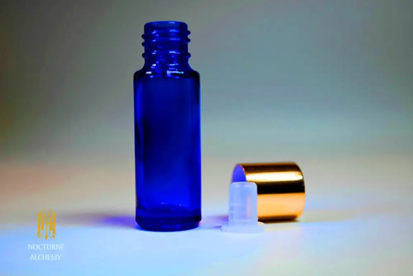 5ml sample bottle:  Slender Blue with orifice insert and gold shiney toned lid on the side