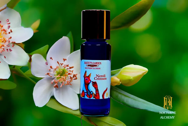 Neroli Crimson  5ml Slender Blue bottle with insert dropper and shiny gold screw lid.