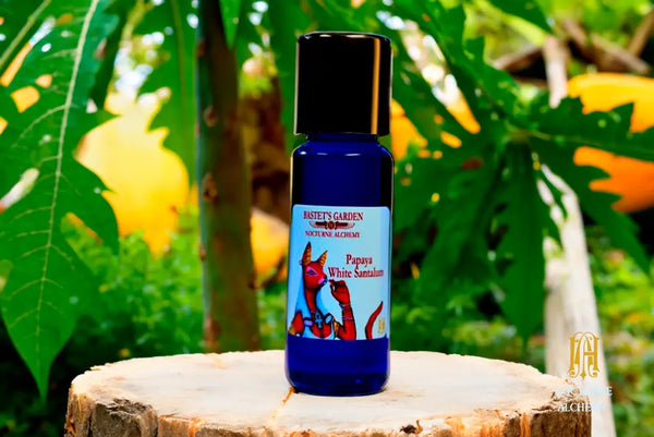 Papaya White Santalum  5ml Slender Blue bottle with insert dropper and shiny gold screw lid.