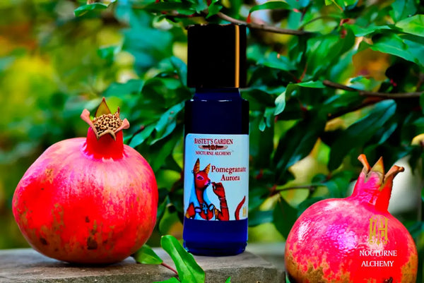 Pomegranate Aurora  5ml Slender Blue bottle with insert dropper and shiny gold screw lid.