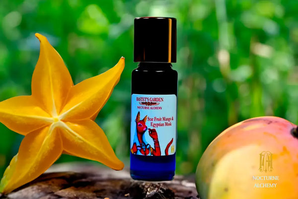 Star Fruit Mango & Egyptian Musk  5ml Slender Blue bottle with insert dropper and shiny gold screw lid.
