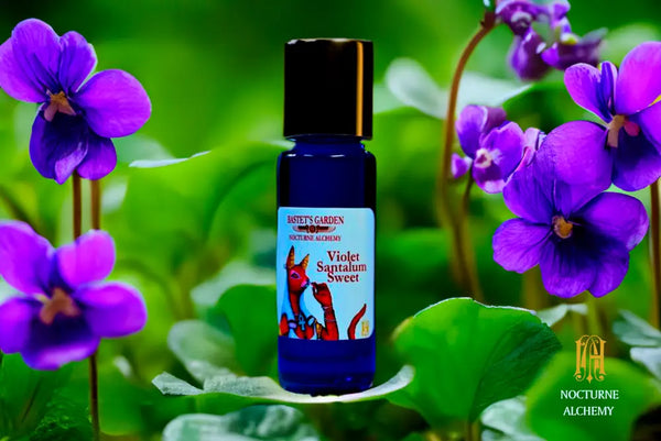 Violet Santalum Sweet  5ml Slender Blue bottle with insert dropper and shiny gold screw lid.