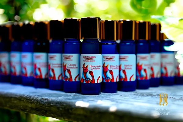 Group photo of Bastet's Garden in slender blue bottles